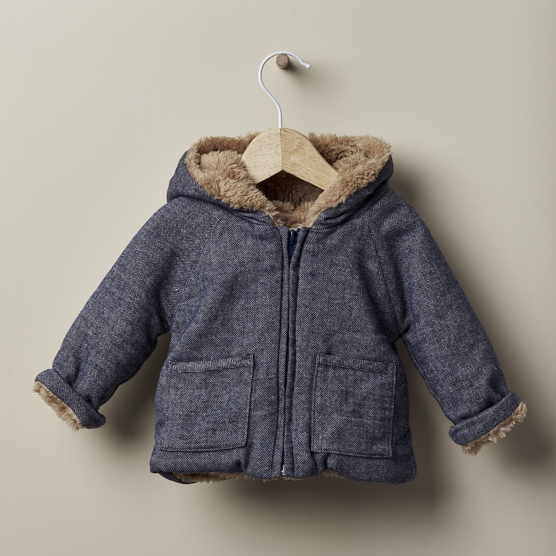 Cappottino lavorato a maglia con interno in pelliccia