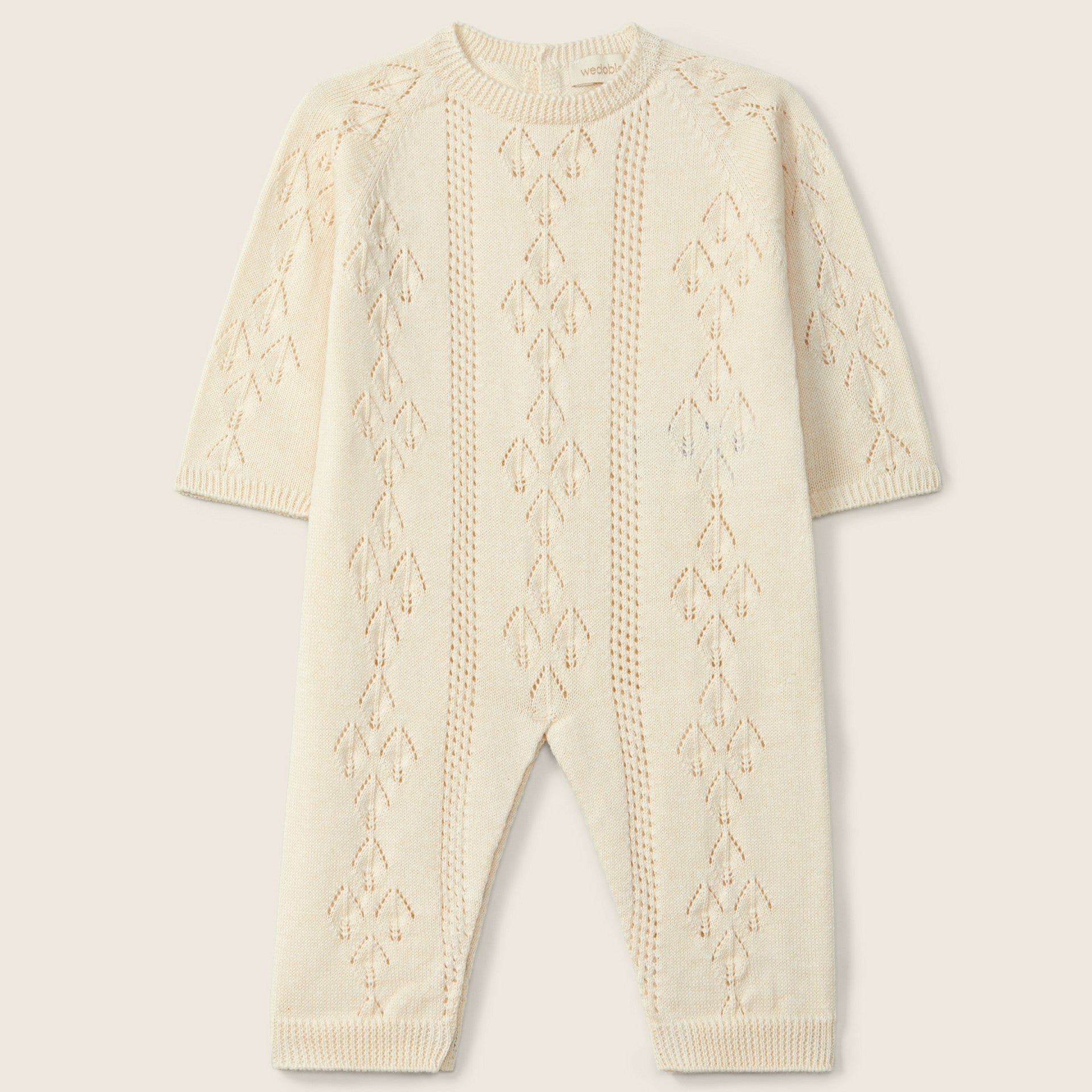 Tuta lavorata a maglia in cotone biologico | AMORE SENZA LIMITI