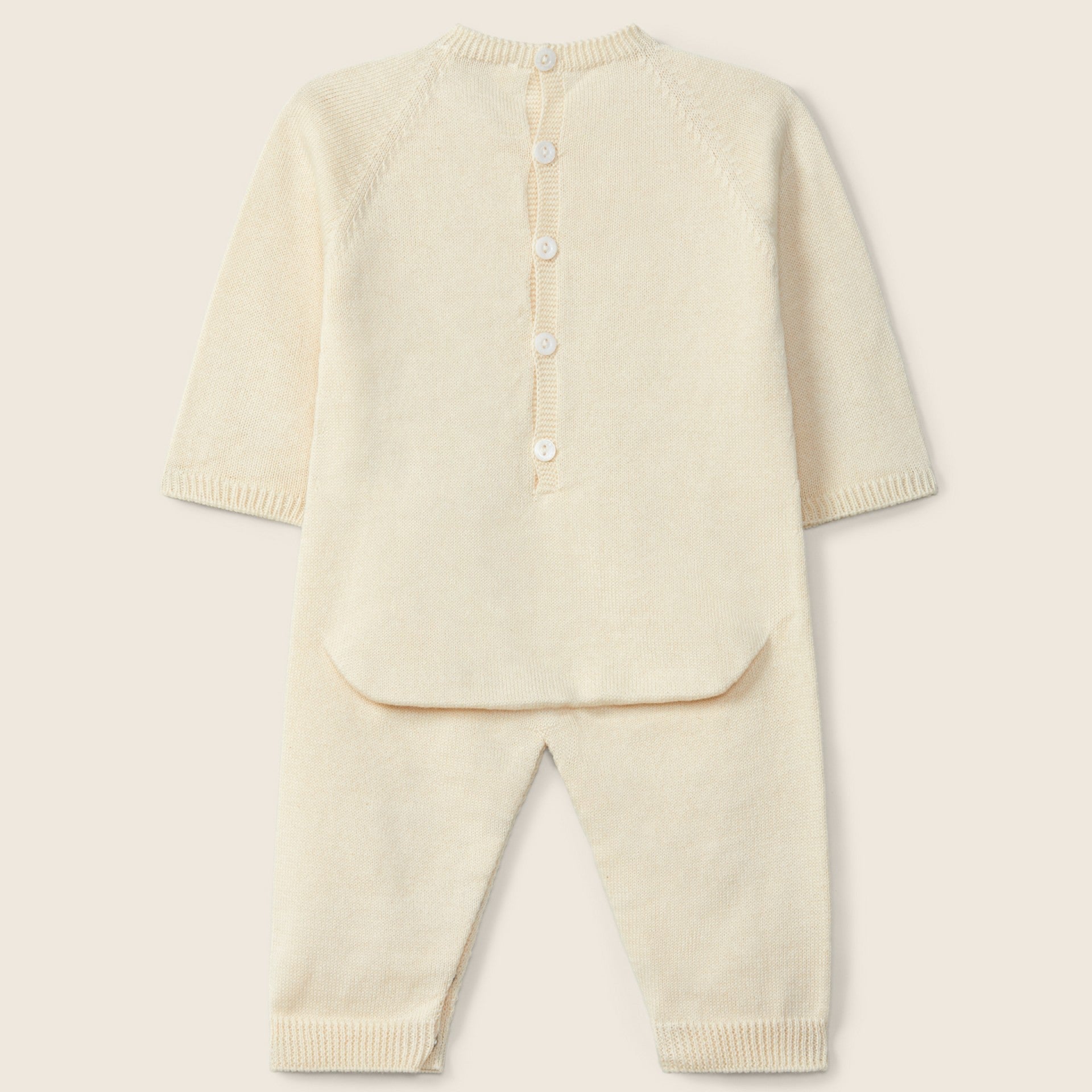 Tuta lavorata a maglia in cotone biologico | AMORE SENZA LIMITI